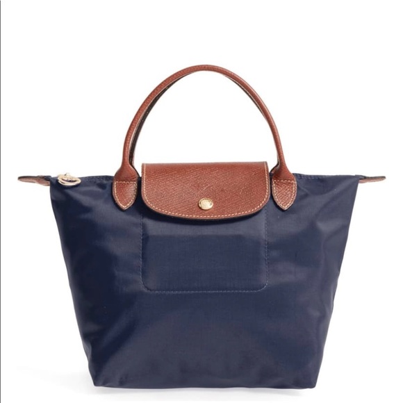 Longchamp Handbags - Gently used navy longchamp navy bag